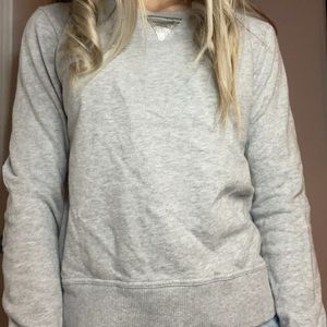 Light gray long sleeve shiny metallic elbow pads